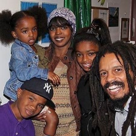 Joshua Omaru Marley and his family took a picture during his childhood. 